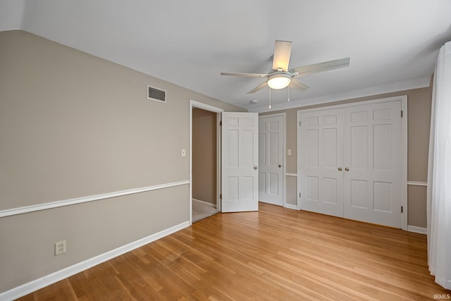 201 Colony Rd, West Lafayette, IN 47906 - unfurnished bedroom featuring light wood-style floors, baseboards, a closet, and ceiling fan