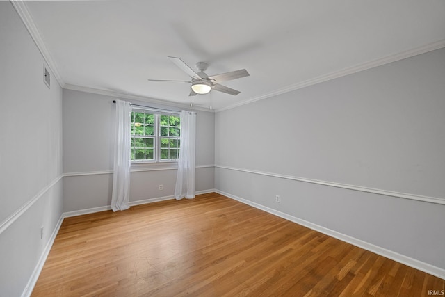 201 Colony Rd, West Lafayette, IN 47906 - spare room with ceiling fan, crown molding, light wood-type flooring, and baseboards