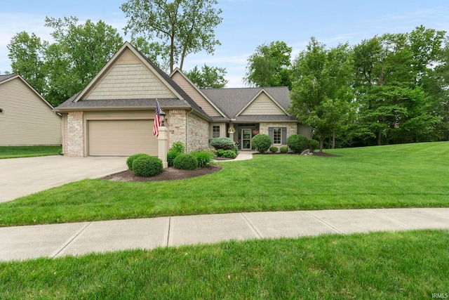 15829 Winterberry Ct, Huntertown, IN 46748 - view of front facade featuring driveway, an attached garage, stone siding, a front yard, and roof with shingles