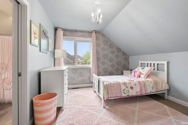 15829 Winterberry Ct, Huntertown, IN 46748 - bedroom with lofted ceiling, carpet, wallpapered walls, and a textured ceiling