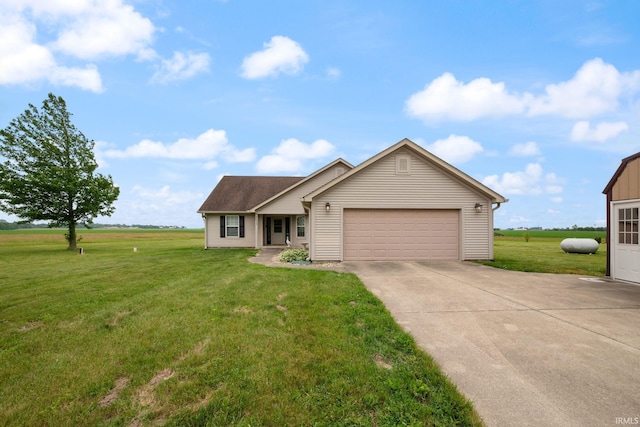 8633 State Rd 28 E, Clarks Hill, IN 47930 - ranch-style house featuring driveway, a garage, and a front lawn
