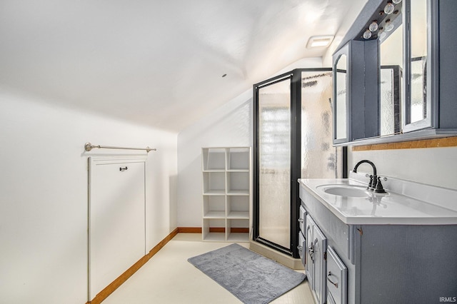 831 W Colfax Ave, South Bend, IN 46601 - bathroom featuring vaulted ceiling, vanity, a shower stall, and concrete flooring