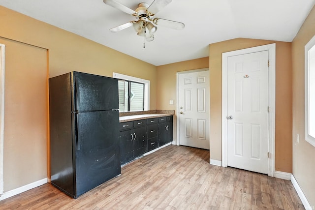 211 N Poplar St, Lagrange, IN 46761 - kitchen with freestanding refrigerator, light wood-type flooring, a ceiling fan, and baseboards
