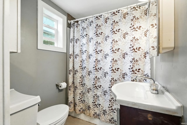 211 N Poplar St, Lagrange, IN 46761 - full bath with vanity, toilet, and curtained shower