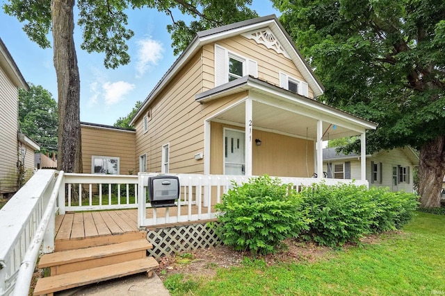 211 N Poplar St, Lagrange, IN 46761 - view of front of property with a wooden deck