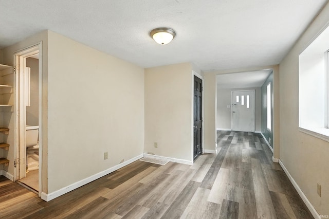 211 N Poplar St, Lagrange, IN 46761 - unfurnished room with wood finished floors and baseboards