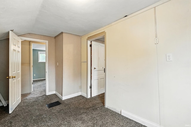 211 N Poplar St, Lagrange, IN 46761 - unfurnished bedroom featuring carpet flooring, lofted ceiling, and baseboards