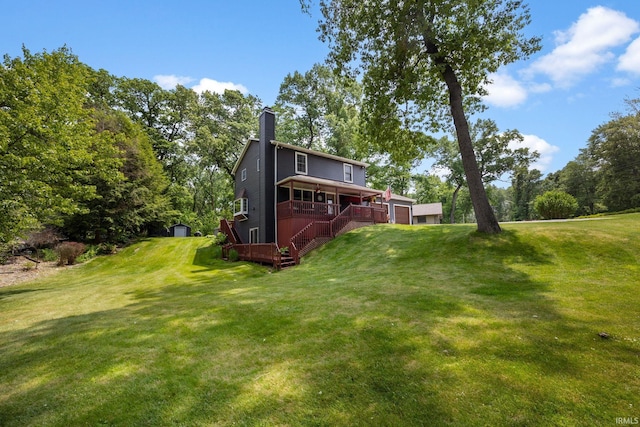 30986 Creekwood Ter, Osceola, IN 46561 - view of green lawn featuring an attached garage, stairway, and covered porch
