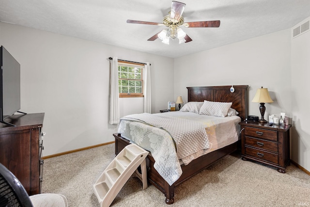 30986 Creekwood Ter, Osceola, IN 46561 - bedroom featuring light carpet, baseboards, and a ceiling fan