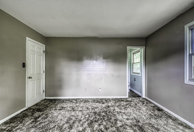 1212 Summit Ave, Bluffton, IN 46714 - empty room featuring carpet and baseboards