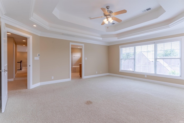 9081 Halston Cir, Newburgh, IN 47630 - unfurnished room with a tray ceiling, light colored carpet, ornamental molding, ceiling fan, and recessed lighting