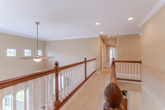 9081 Halston Cir, Newburgh, IN 47630 - hallway featuring healthy amount of natural light, crown molding, recessed lighting, carpet flooring, and baseboards