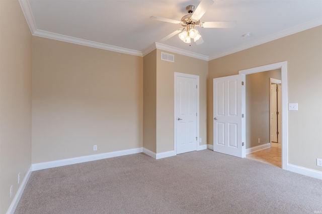 9081 Halston Cir, Newburgh, IN 47630 - unfurnished bedroom featuring ornamental molding, light colored carpet, baseboards, and ceiling fan