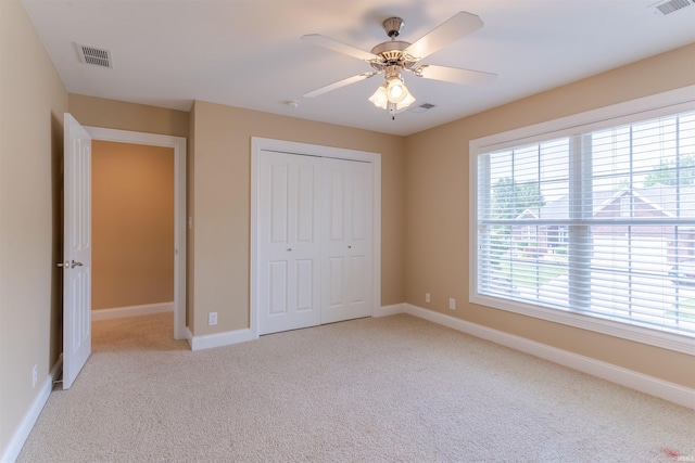 9081 Halston Cir, Newburgh, IN 47630 - unfurnished bedroom with carpet floors, a closet, baseboards, and ceiling fan