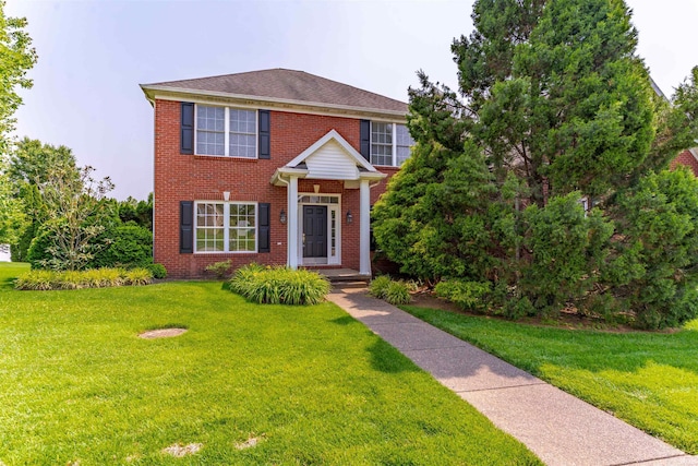9081 Halston Cir, Newburgh, IN 47630 - view of front facade featuring brick siding and a front lawn