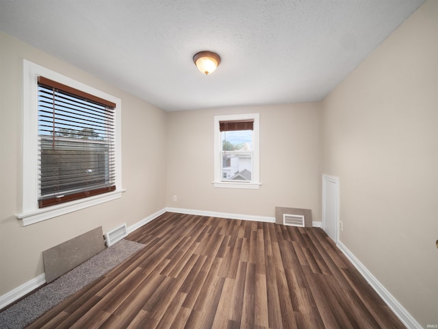 4522 S Calhoun St, Fort Wayne, IN 46807 - spare room with wood finished floors and baseboards
