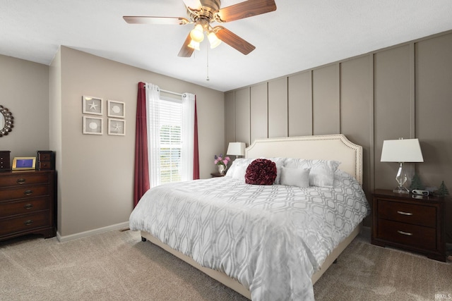 18165 Farmington Hills Dr, South Bend, IN 46637 - bedroom with carpet flooring, baseboards, a ceiling fan, and a decorative wall