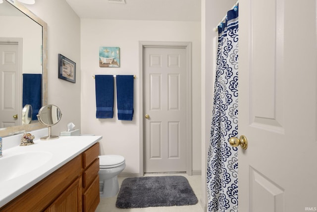 18165 Farmington Hills Dr, South Bend, IN 46637 - full bath with vanity, toilet, tile patterned floors, and a shower with shower curtain