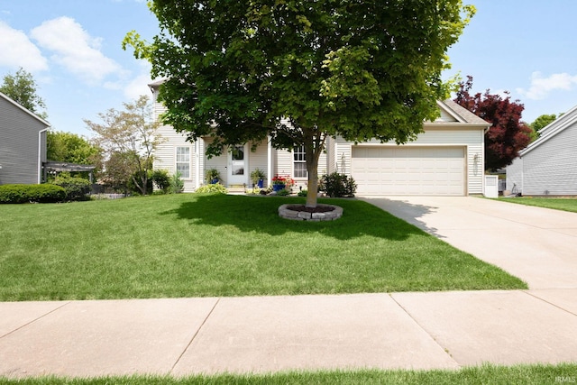 18165 Farmington Hills Dr, South Bend, IN 46637 - obstructed view of property featuring concrete driveway, a front yard, and an attached garage