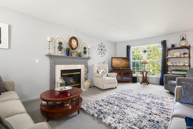 18165 Farmington Hills Dr, South Bend, IN 46637 - carpeted living area featuring a tile fireplace and baseboards