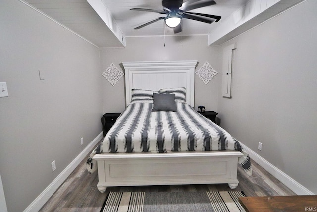5547 N W Shafer Dr, Monticello, IN 47960 - bedroom with wood finished floors, baseboards, and ceiling fan