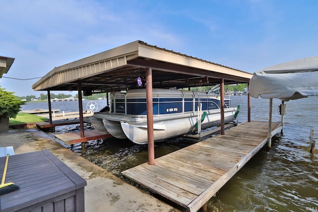 5547 N W Shafer Dr, Monticello, IN 47960 - dock featuring boat lift and a water view