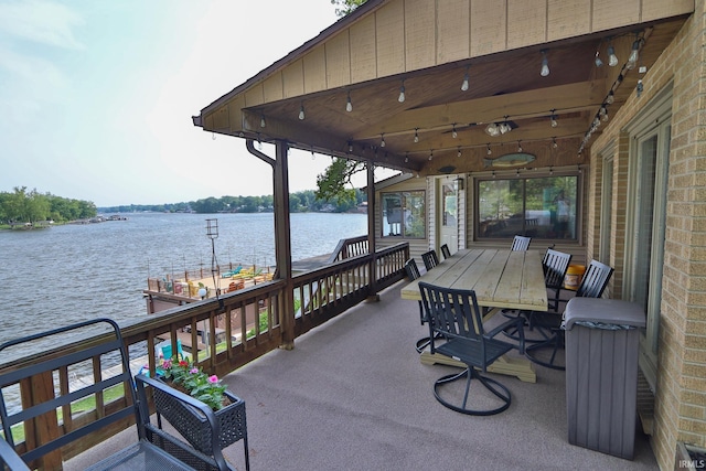 5547 N W Shafer Dr, Monticello, IN 47960 - view of patio featuring a water view and a boat dock