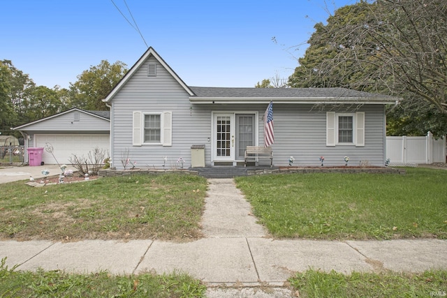 804 E Vistula St, Bristol, IN 46507 - view of front of home with a detached garage and a shingled roof