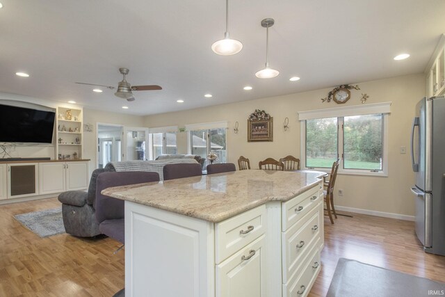 804 E Vistula St, Bristol, IN 46507 - kitchen featuring freestanding refrigerator, light wood finished floors, a ceiling fan, recessed lighting, and open floor plan
