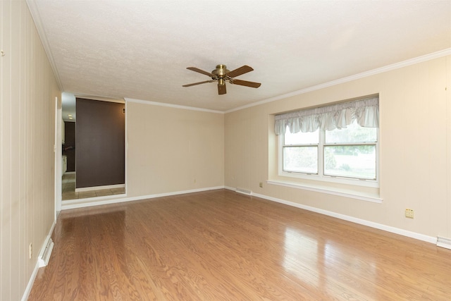 1402 Hampshire Dr, South Bend, IN 46614 - unfurnished room with wood finished floors, ceiling fan, crown molding, and baseboards