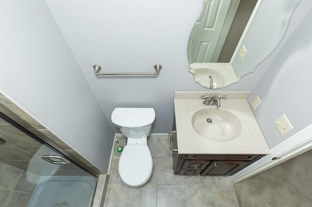 1402 Hampshire Dr, South Bend, IN 46614 - full bathroom with toilet, vanity, tile patterned flooring, and a shower
