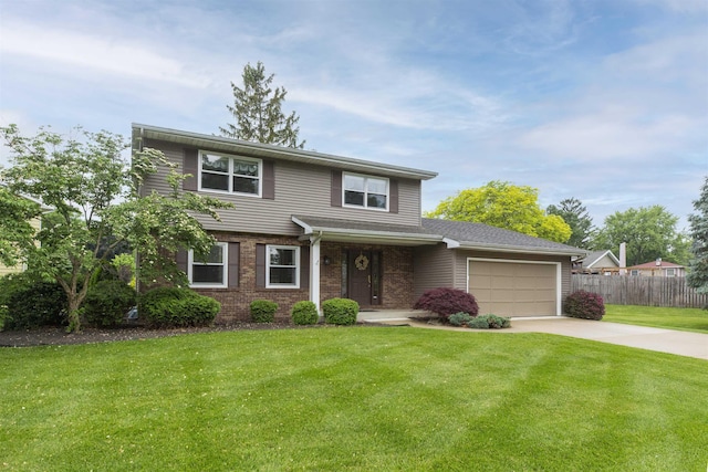 1402 Hampshire Dr, South Bend, IN 46614 - view of front of home featuring driveway, a garage, and brick siding