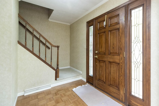 1402 Hampshire Dr, South Bend, IN 46614 - entryway with baseboards, stairs, and ornamental molding