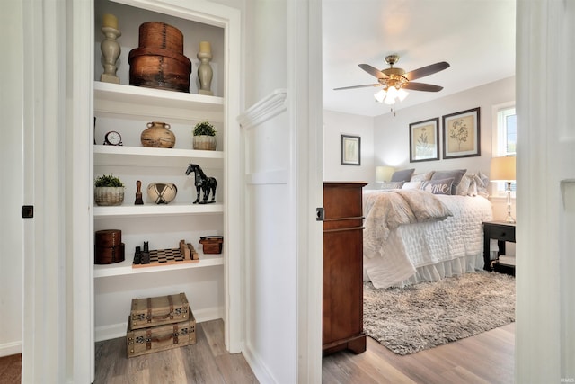 1908 N Iroquois Dr, Evansville, IN 47715 - bedroom with wood finished floors and a ceiling fan