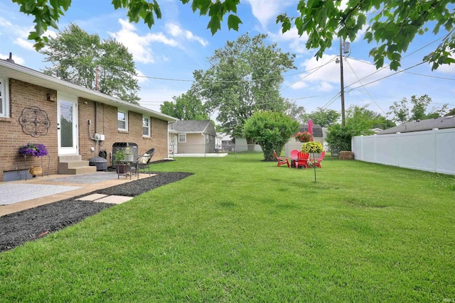 1908 N Iroquois Dr, Evansville, IN 47715 - view of yard featuring a patio