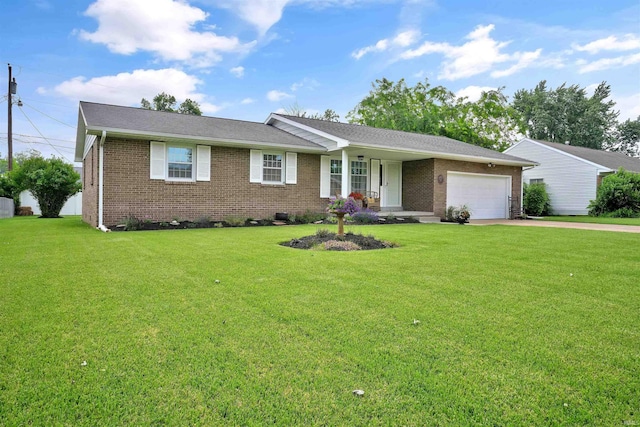 1908 N Iroquois Dr, Evansville, IN 47715 - ranch-style house featuring a garage, brick siding, driveway, and a front yard