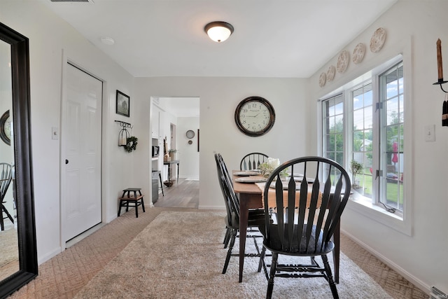 1908 N Iroquois Dr, Evansville, IN 47715 - carpeted dining area featuring baseboards