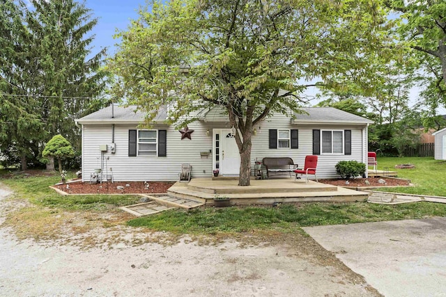 3408 Addison Ave, Fort Wayne, IN 46805 - rear view of house with a wooden deck, a lawn, and a shingled roof