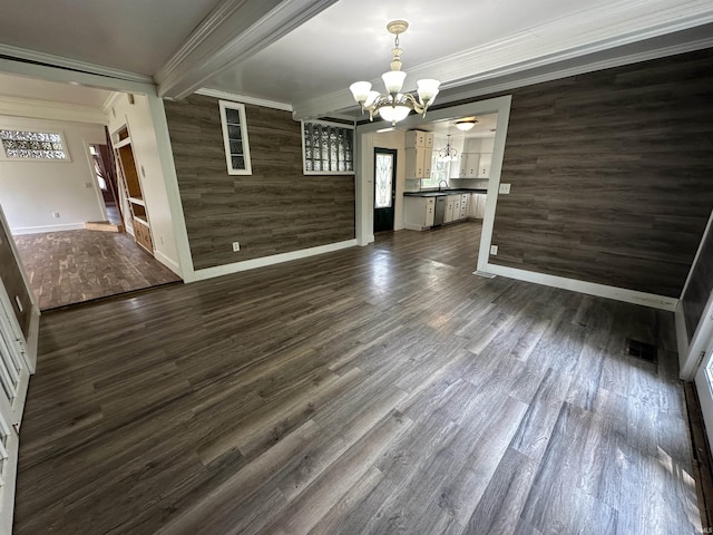 1020 E State St, Albany, IN 47320 - unfurnished dining area with a chandelier, baseboards, crown molding, healthy amount of natural light, and dark wood finished floors