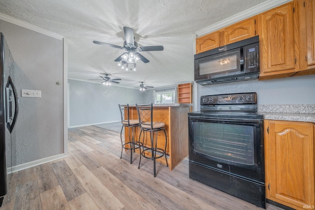 1011 N Lincolnshire Blvd, Marion, IN 46952 - kitchen featuring black appliances, crown molding, baseboards, a ceiling fan, and a textured wall