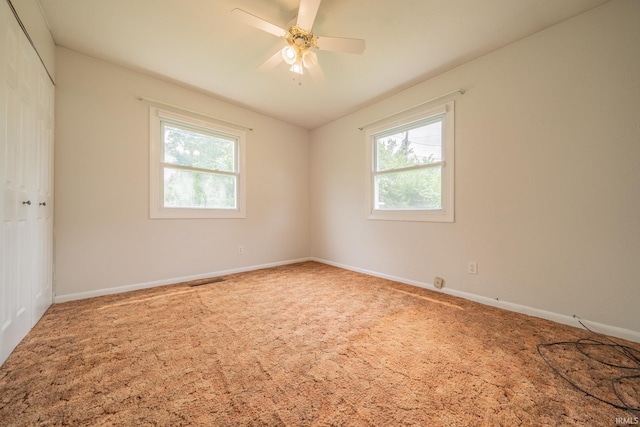 1011 N Lincolnshire Blvd, Marion, IN 46952 - carpeted spare room featuring healthy amount of natural light, a ceiling fan, and baseboards