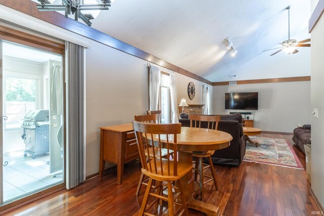 8816 Beacon Woods Pl, Fort Wayne, IN 46804 - dining area with vaulted ceiling, wood finished floors, and ceiling fan
