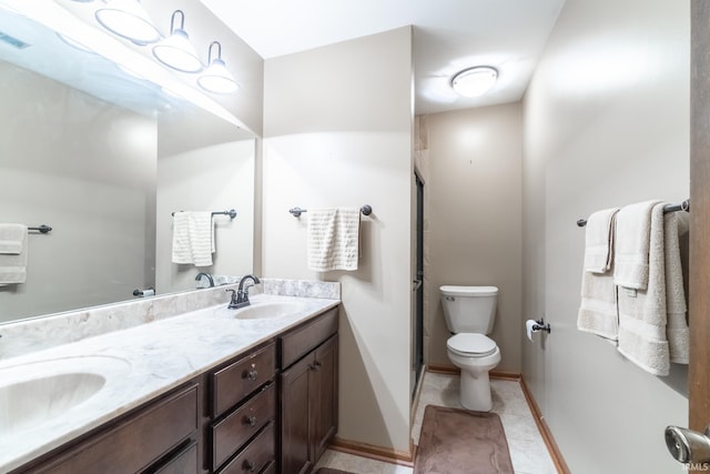 8816 Beacon Woods Pl, Fort Wayne, IN 46804 - bathroom with a stall shower, toilet, double vanity, baseboards, and tile patterned floors