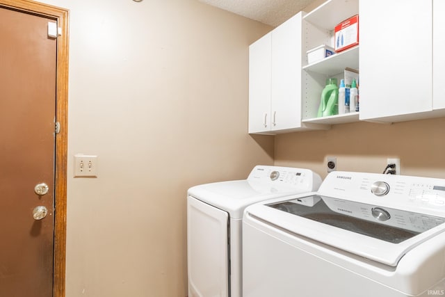 8816 Beacon Woods Pl, Fort Wayne, IN 46804 - laundry room with cabinet space and washing machine and dryer