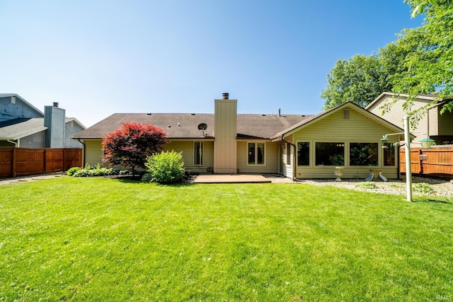 8816 Beacon Woods Pl, Fort Wayne, IN 46804 - back of house with a chimney, a patio, and roof with shingles