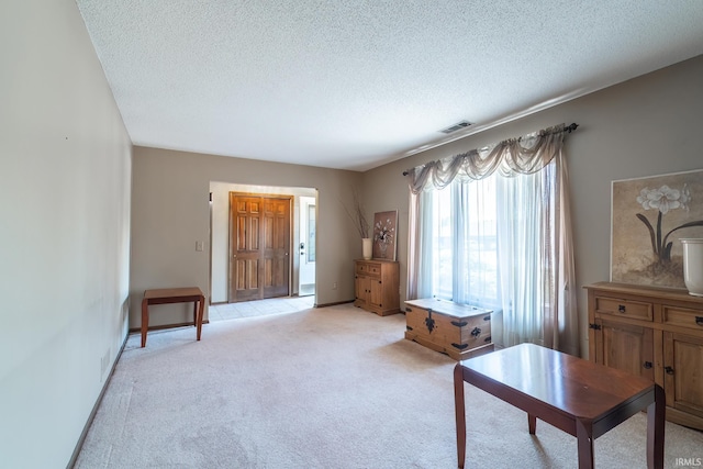 8816 Beacon Woods Pl, Fort Wayne, IN 46804 - living area with light carpet and a textured ceiling