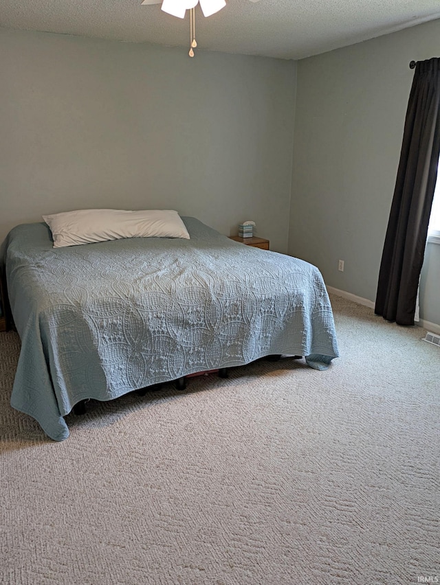 5 E Viola Ave, Washington, IN 47501 - carpeted bedroom with ceiling fan and baseboards