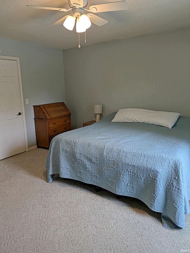 5 E Viola Ave, Washington, IN 47501 - carpeted bedroom featuring a ceiling fan and a textured ceiling