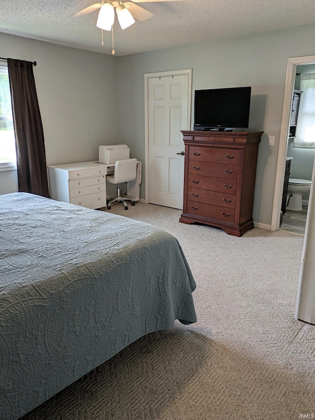 5 E Viola Ave, Washington, IN 47501 - bedroom featuring light carpet, a textured ceiling, a ceiling fan, and baseboards
