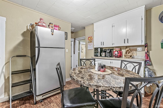 719 W Franklin St, Elkhart, IN 46516 - dining room featuring wood finished floors